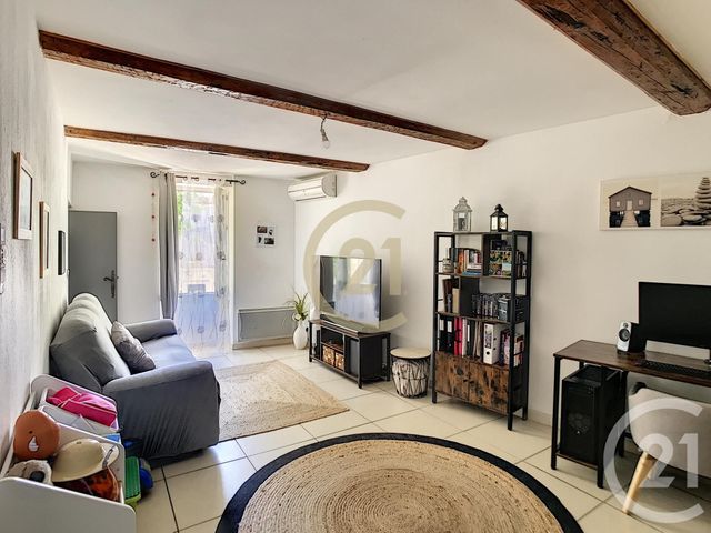 Afficher la photo en grand Appartement F3 à louer - 3 pièces - 76.41 m2 - DOMAZAN - 30 - LANGUEDOC-ROUSSILLON - Century 21 Beven Immobilier