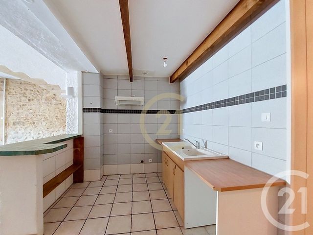 Appartement F2 à louer - 2 pièces - 64.22 m2 - REMOULINS - 30 - LANGUEDOC-ROUSSILLON - Century 21 Beven Immobilier