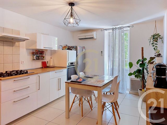 Appartement F3 à louer - 3 pièces - 76.41 m2 - DOMAZAN - 30 - LANGUEDOC-ROUSSILLON - Century 21 Beven Immobilier